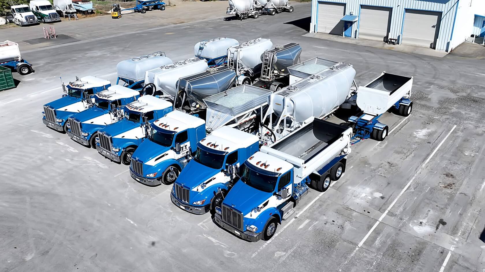 A group of trucks side by side