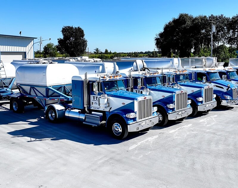 A fleet of bulk transportation trucks